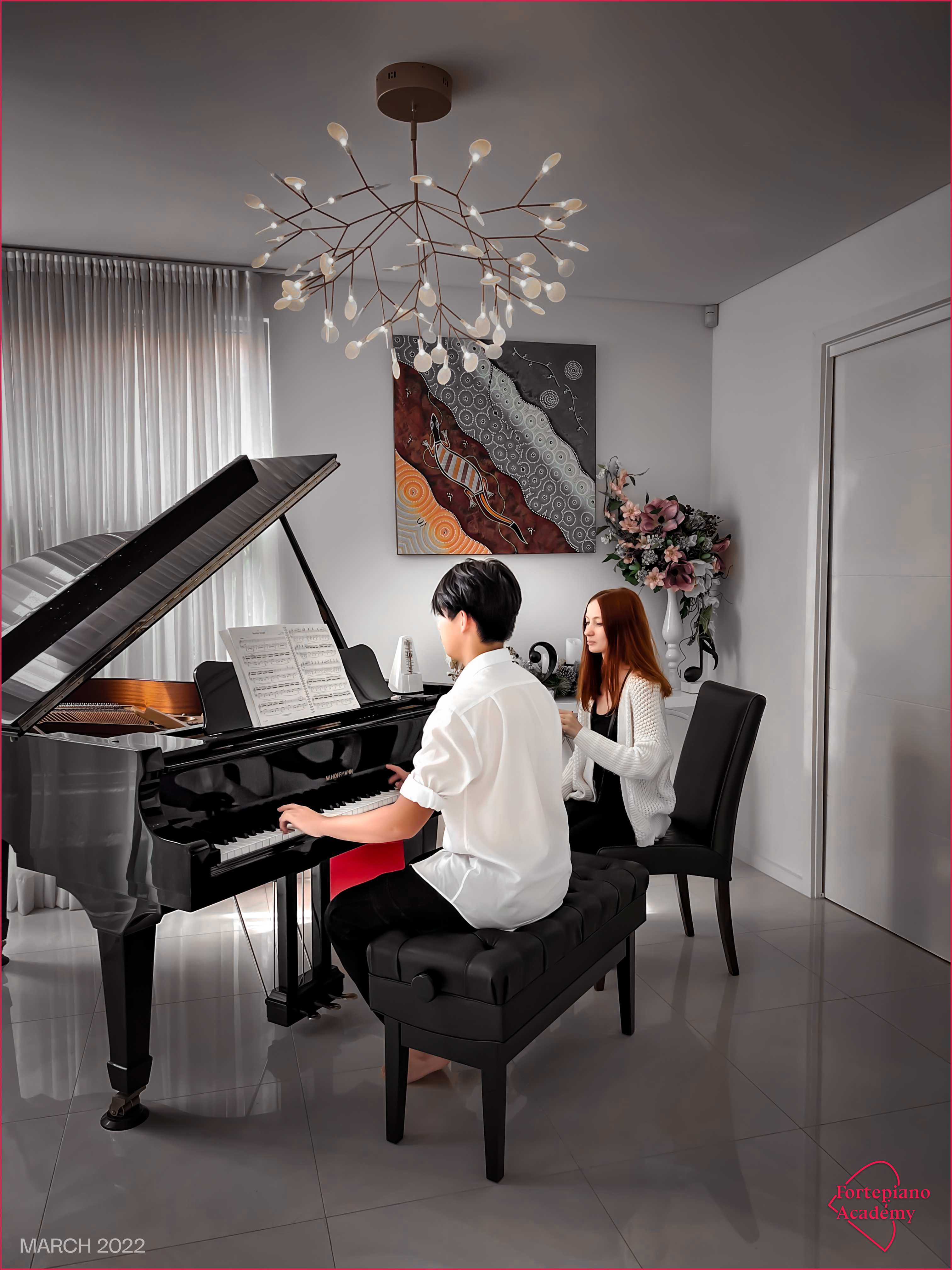 Student performing at the grand piano